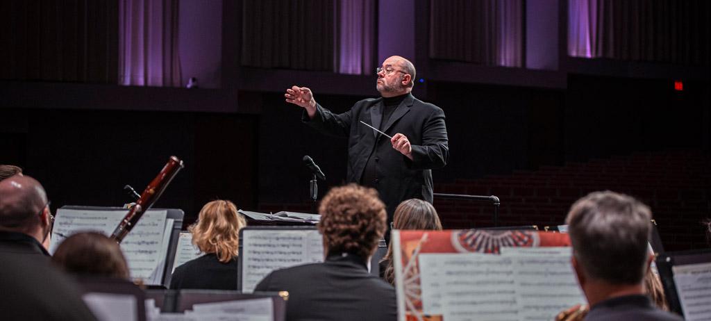 Dr Humphries conducting the symphonic band